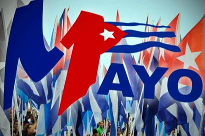 Llegan amigos de diversos países para participar en el Primero de Mayo